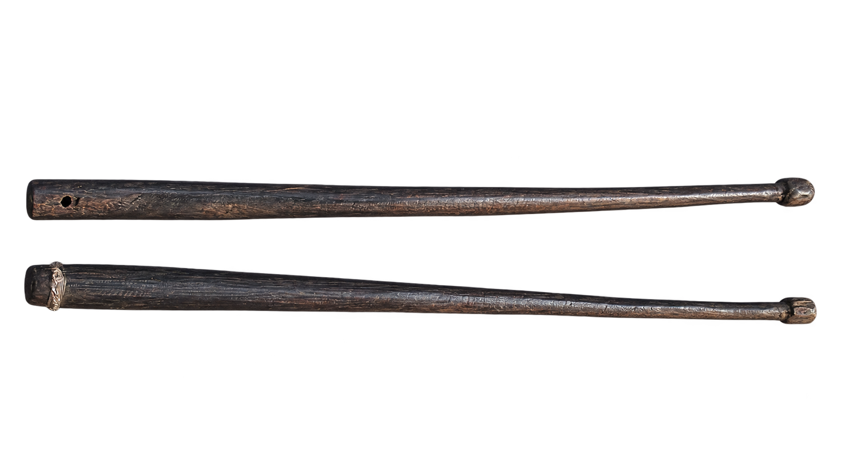 A pair of traditional tambul beaters known as tibul